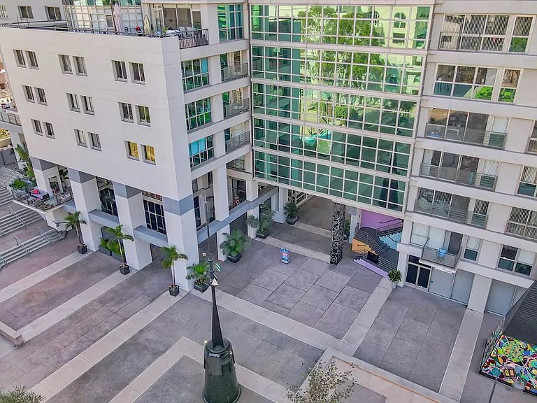 Step out of the building into Grand Hope Park