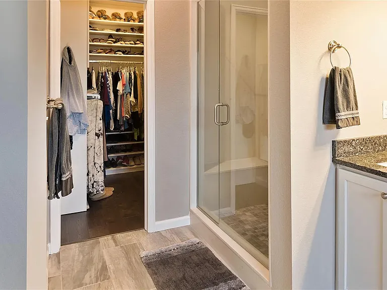Walk-in shower and upgraded closet