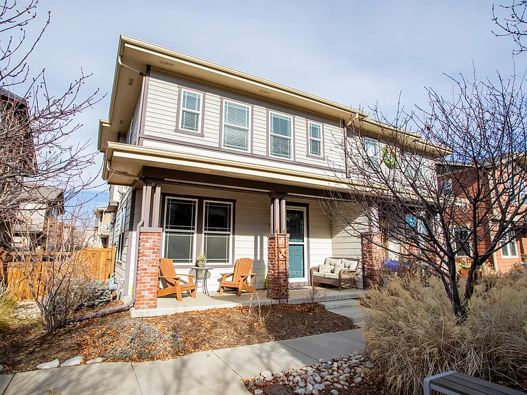 Front of property opens to common courtyard with front and side yard patio