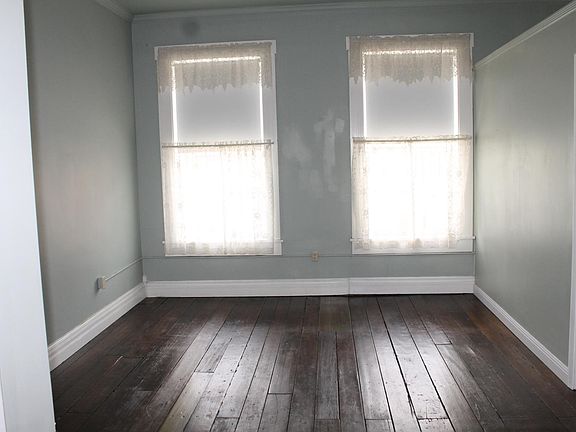 Living room w/ large windows