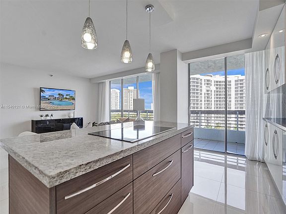 5th image of 3530 Mystic Pointe Dr APT 1014
