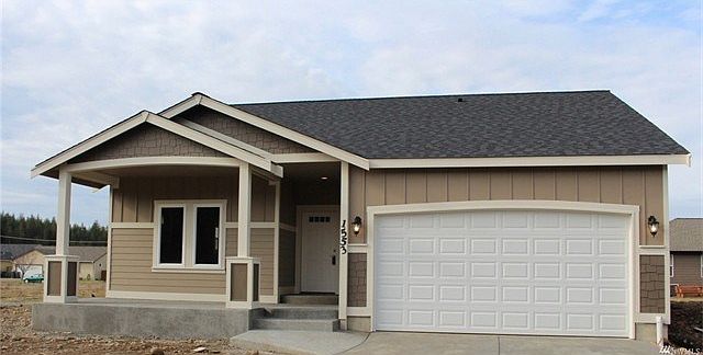Attractive rambler almost complete.  Great room design with painted trim, rich laminate flooring and slab granite kitchen counters.