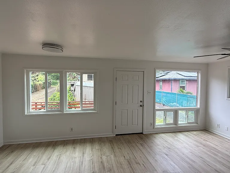 Front view of the living room. New flooring throughout the house