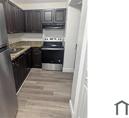 5861 NW 16th Pl #307 — Photo 1