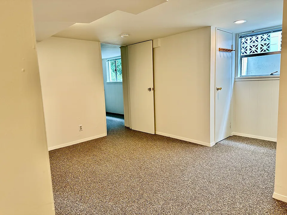 View of den area to bedroom door.