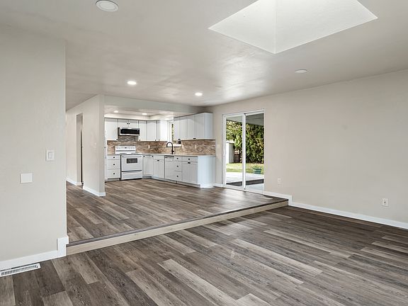 Lower living area looking into kitchen