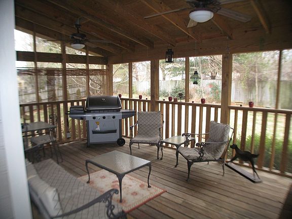 Screened Porch Overlooks Large, Level, Fenced & Private Back