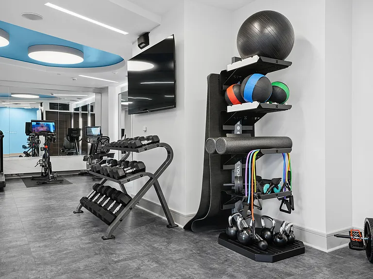 Fitness center with cardio and strength training equipment