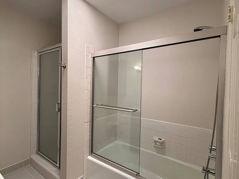 Separate shower and bathtub