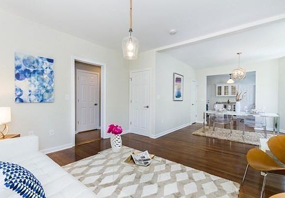 Open layout from kitchen to dining to living