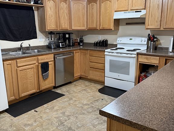 A huge kitchen with plenty of counter space and storage and room to move throughout