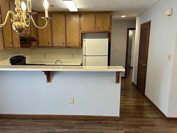 Dining room to kitchen; hall to bedrooms
