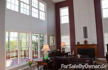 Family Room
						:
						Spacious High Ceiling Family Room with Golf Course view; Andersen Windows.