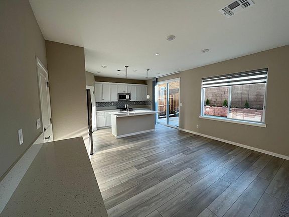 Living Room with Backyard View