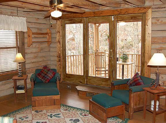 The Den or Sitting Room is very bright and opens to the back deck.