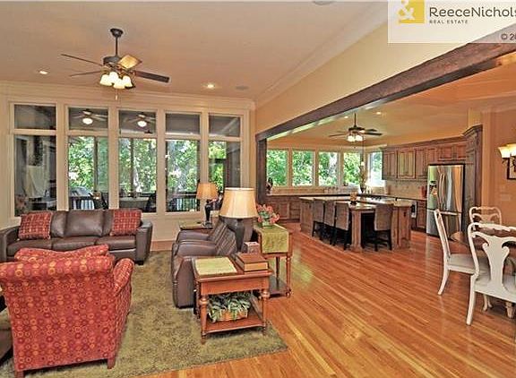 11' ceilings with fabulous line of windows to relish the natural surroundings and privacy!