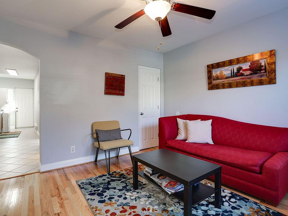 Living room open to kitchen and dining area