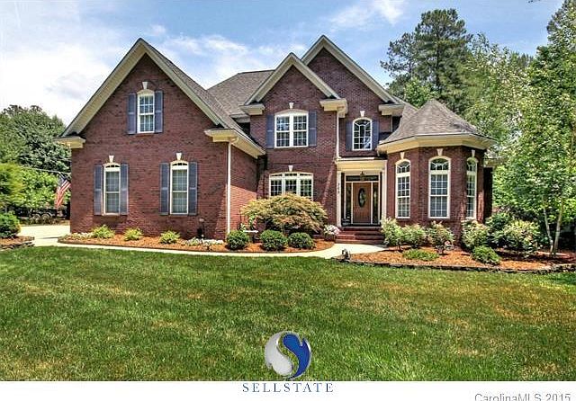 Great location, Well build brick home on a corner parcel. Amazing landscaping throughout the entire property.