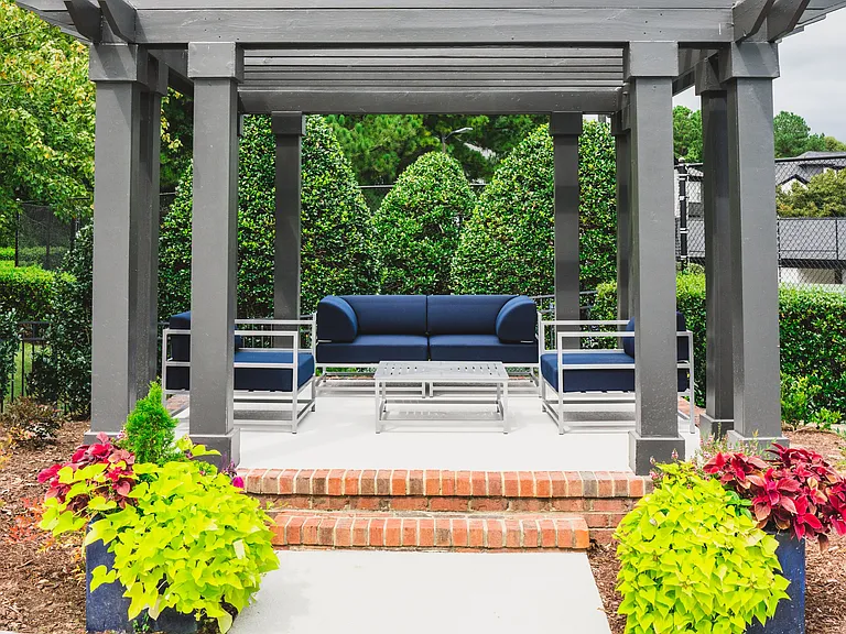 Socialize outdoors in the poolside pergola