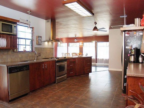 Custom Gourmet Kitchen with Solid Oak Cabinets and Stainless Steel Appliances