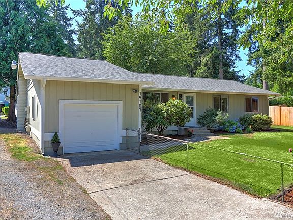 Sought after corner lot has extra space for parking your RV or boat. No HOA!