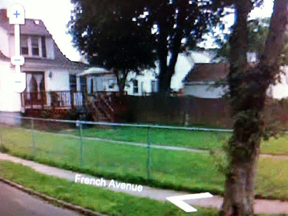 Corner lot. Fenced in leading to detached 2 car garage