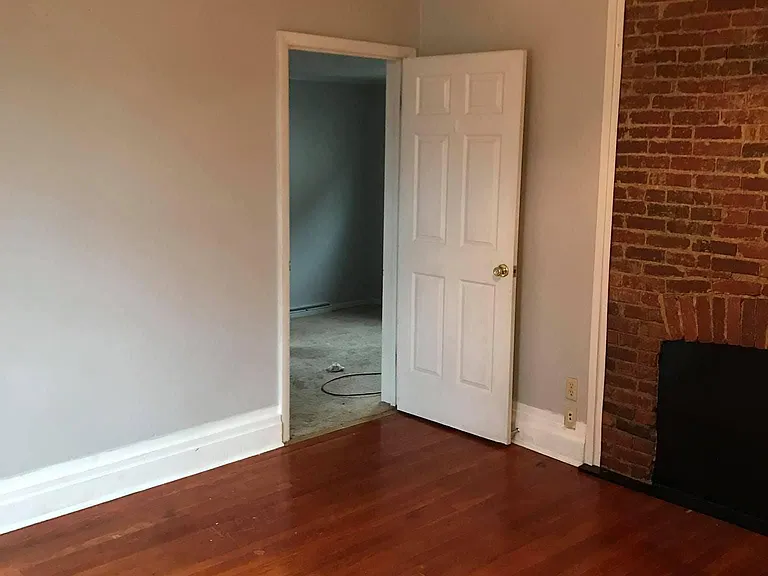 View into 1st floor bedroom from the living room