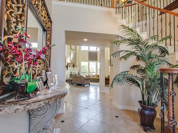 dramatic curved staircases encourage you in to have a look a