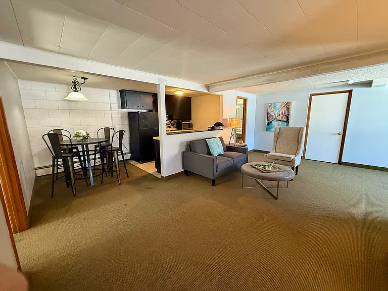 This is the walkout unit of a triplex. Private backyard perfect for a dog or kids.