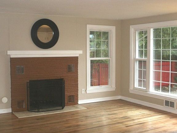 Refinished hardwood floors throughout. The fireplace is a perfect candidate for an insert that could