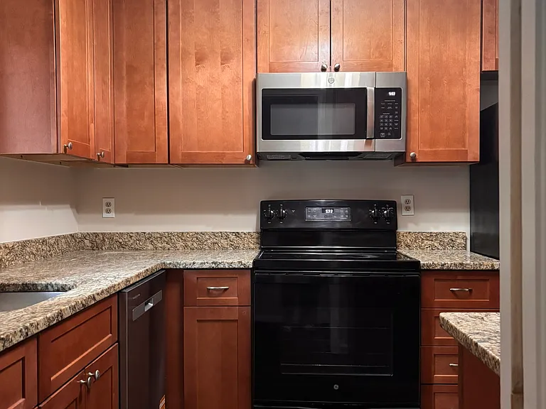 Kitchen with soft close drawers and lots of storage space.