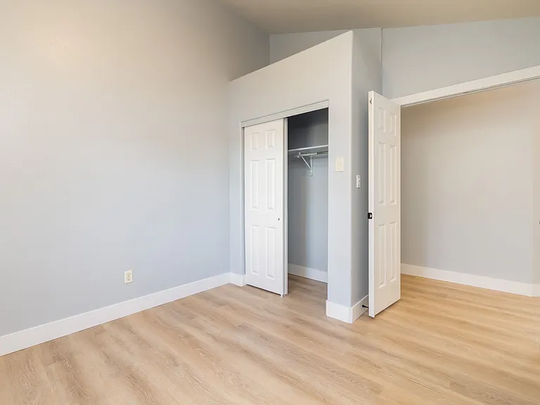 Looking towards closet and doors