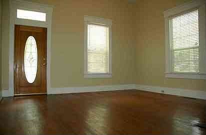 Entrance has tiled fireplace, gorgeous door