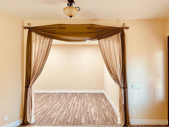 Office/ Den to your right after you enter from the main door.