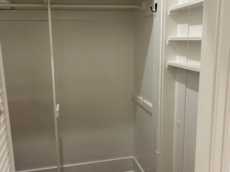 Walk in closet with storage