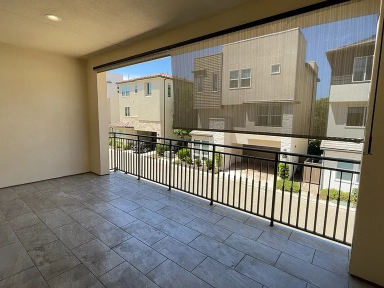 2nd floor - Great room - Kitchen, living room, under-stair storage, bathroom, balcony/patio