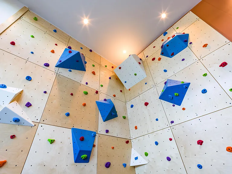 Elevate your fitness routine at Modera Woodstock with an on-site climbing wall, designed for an energizing and unique workout experience in the heart of Portland.