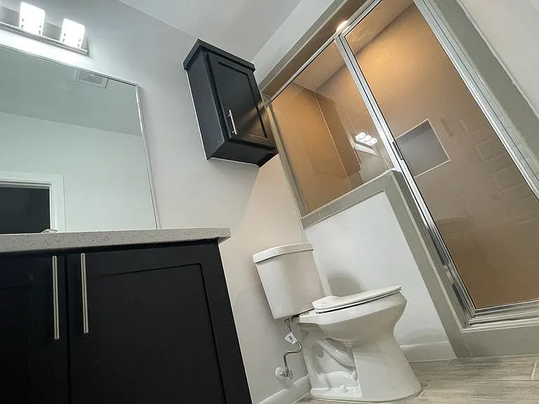 Master bathroom with walk in shower and modern fixtures