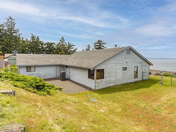 Large open back yard is fenced. A great place for gardening.