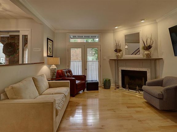 Living room with wood-burning fireplace