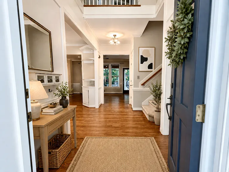 Two story foyer -Virtually Staged