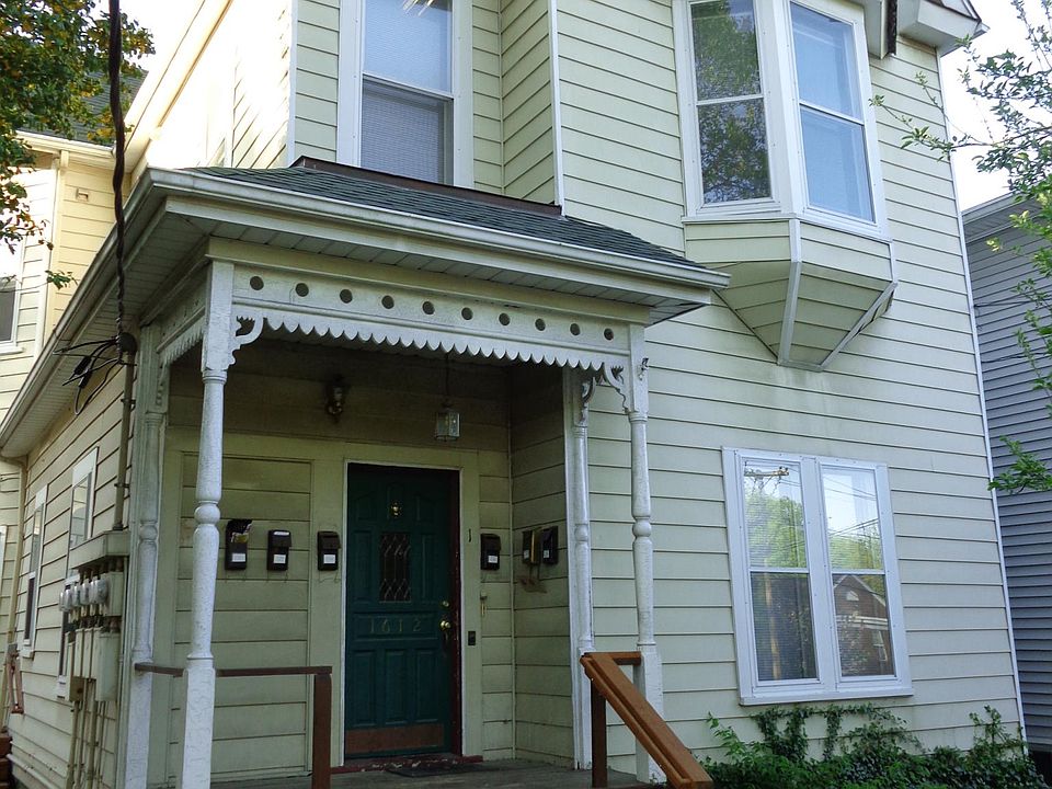 Front elevation main house,carriage in rear