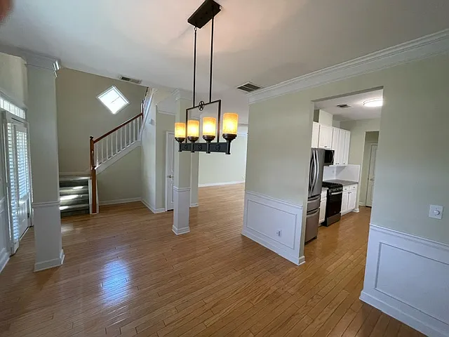 dining room, front door, living space, kitchen