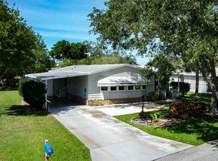 910 Cypress St, Barefoot Bay, FL 32976