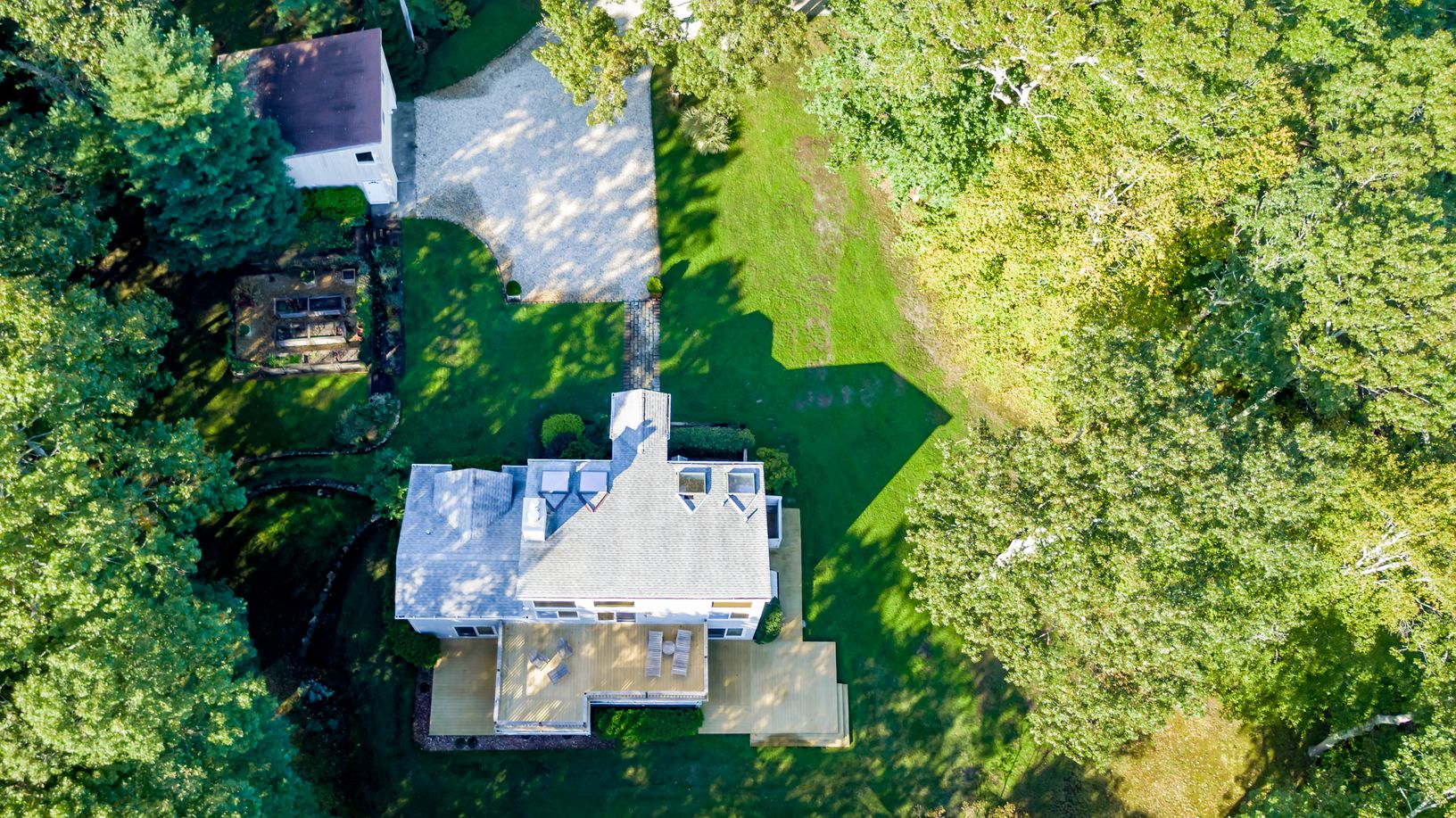  Aerial of Portion of Property, Home and Garage & Driveway