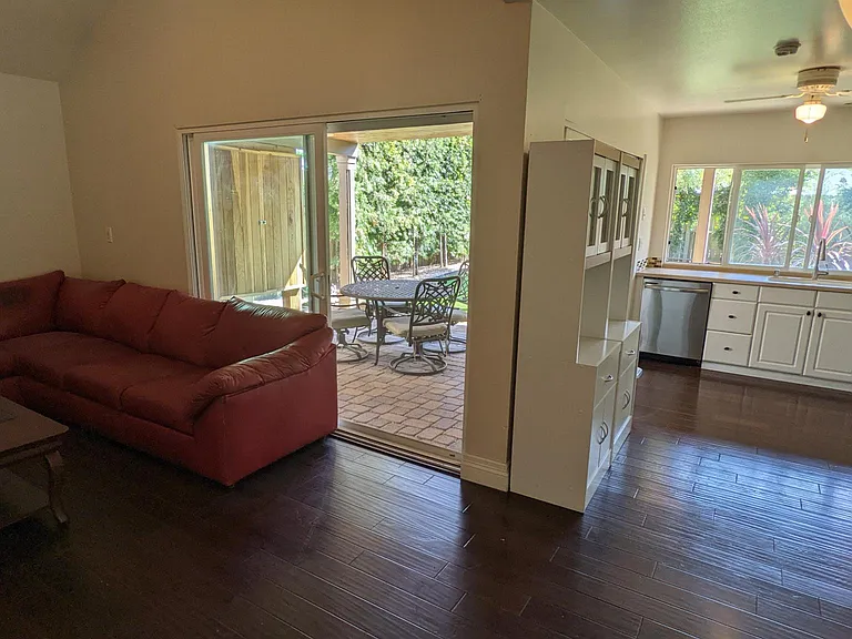 Note the hardwood floors throughout the kitchen, dining room and family room