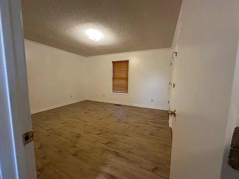 Primary Bedroom off the Kitchen