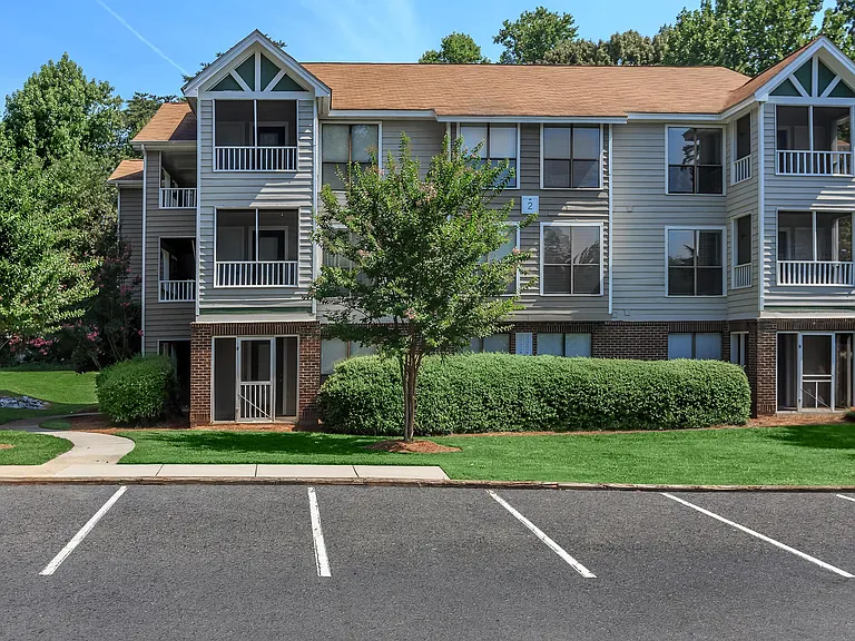 Beautifully Maintained Apartment Building with Reserved Parking Spaces Out Front
