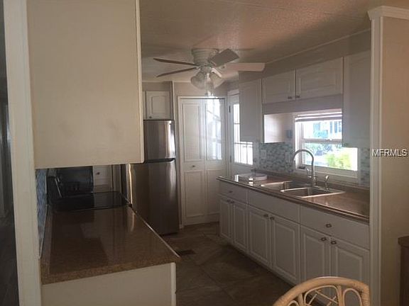4th image of 7880 54th Ave N Lot 114