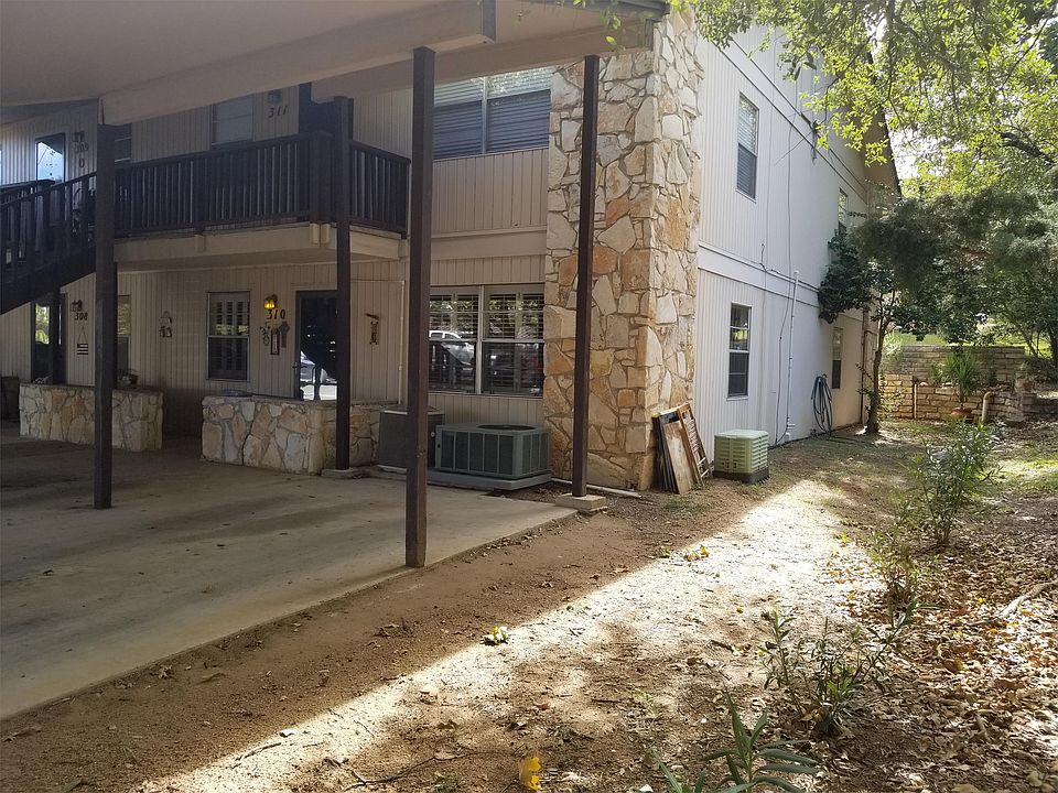 Entrance of unit on ground floor and extra side area space.